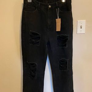 Black ripped boyfriends jeans. Never worn- I got the wrong size. Tags still on.